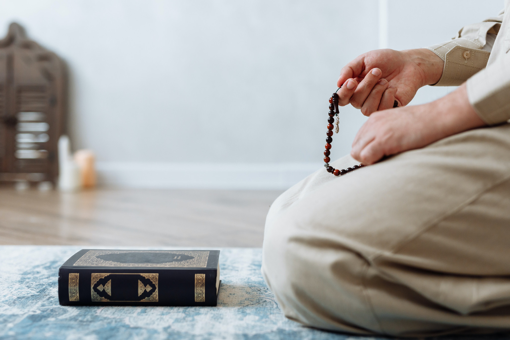 Close-Up Shot of Person Holding Prayer Beads